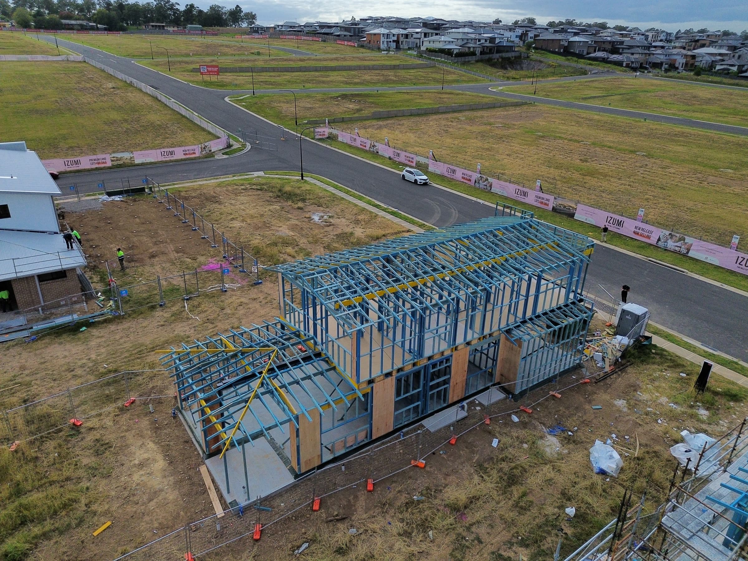 Drone view of timber framing over concrete slab on a new build lot